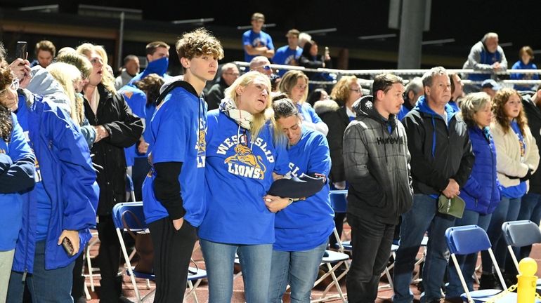 A moment of silence was held before the West Islip High...