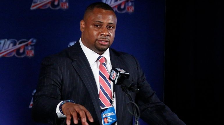 Troy Vincent, NFL executive vice president, speaks to the media...