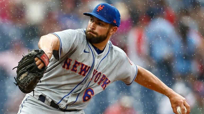 Pitcher Nate Fisher #64 of the Mets makes his Major League...