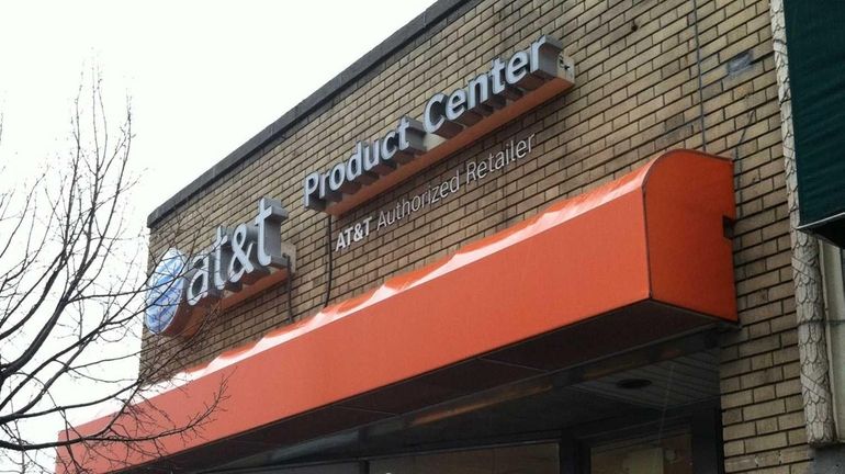Two men armed with handguns robbed an AT&T Wireless store...