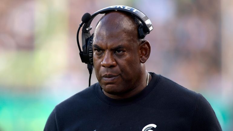 Michigan State coach Mel Tucker walks the sideline during the...