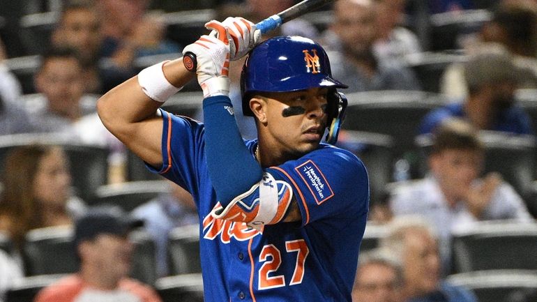 The Mets' Mark Vientos looks for his pitch during the...