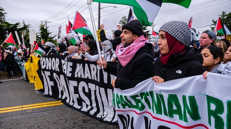 Pro Palestine demonstrators rally Sunday outside the Northrup Grumman plant...