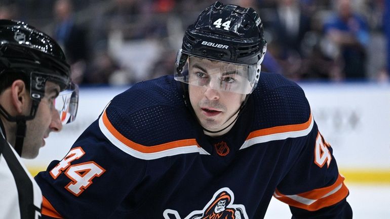 Islanders center Jean-Gabriel Pageau sets before a face-off against the...