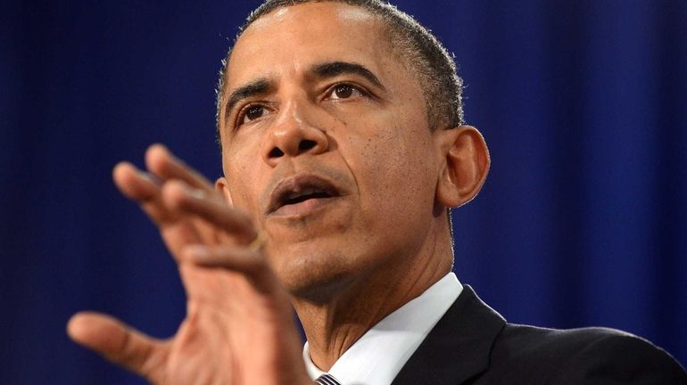 President Barack Obama speaks on the economy during a campaign...