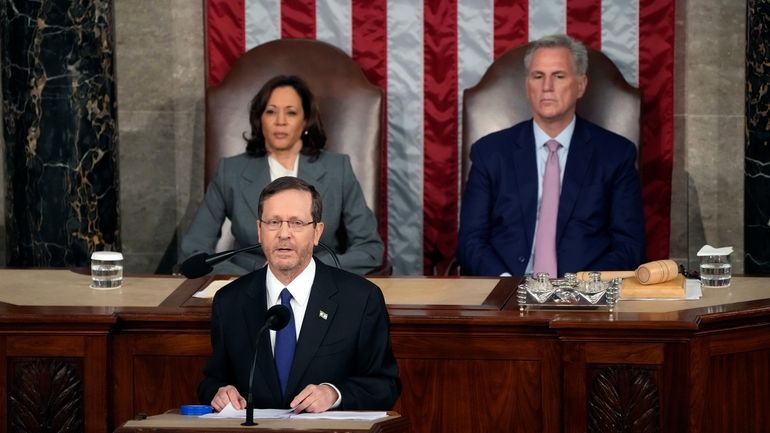 Israeli President Isaac Herzog speaks to a joint session of...