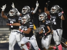 Hewlett football celebrates 100 years with comeback win over Sewanhaka