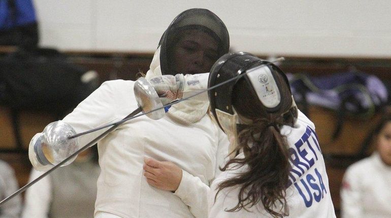 Arianna Ferritetti of Ward Melville goes up against Alex Luongo...