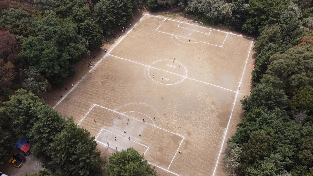 a-football-league-plays-in-an-extinct-volcano-crater-fiercely-guarding