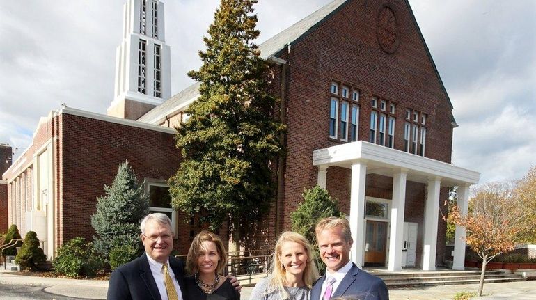 The Rev. Jimmy Only, rear left, and his wife, Colleen,...