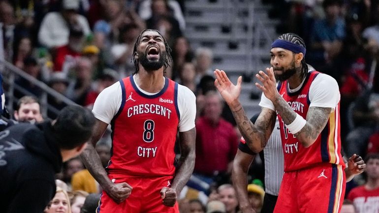 New Orleans Pelicans forward Naji Marshall (8) reacts with forward...