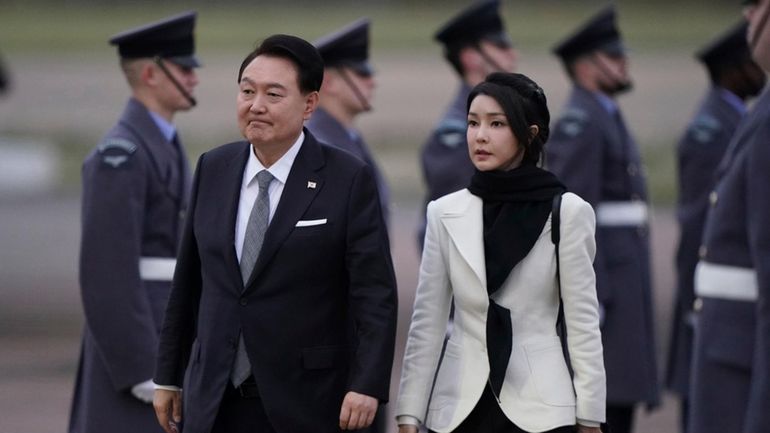 South Korea's President Yoon Suk Yeol and first lady Kim...