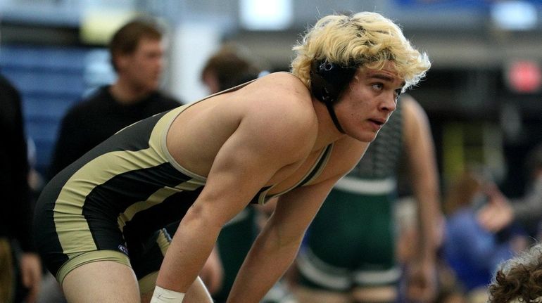 Wantagh's Noah Corwin, in a 172-pound bout against Lancaster's Michael...