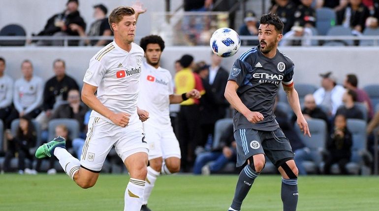 David Villa of New York City FC takes a pass...