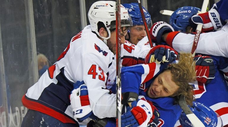 The Capitals' Tom Wilson takes a roughing penalty during the...