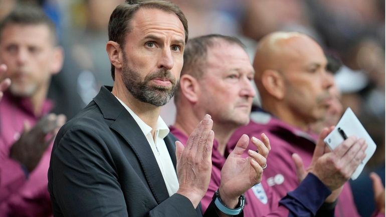 England's head coach Gareth Southgate applauds before the start of...