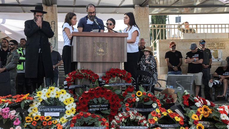 Jonathan Polin and Rachel Goldberg, parents, and sisters Orly and...