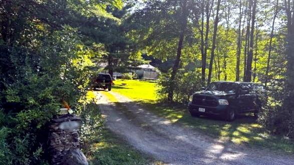 New York State Police investigate the scene on Houck Road...