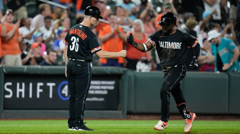 Baltimore's Adam Frazier operating second base in Tuesday's ALDS Game 3  matchup