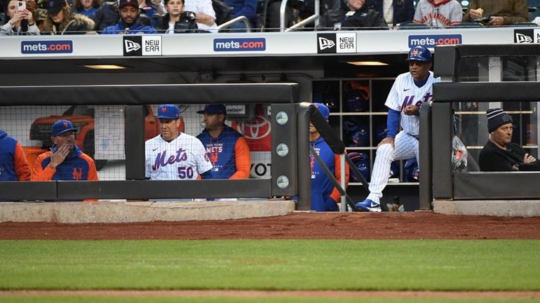 Mets coach Joey Cora in dugout during first inning against the...