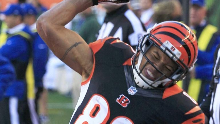 Cincinnati Bengals wide receiver Marvin Jones spikes the ball after...