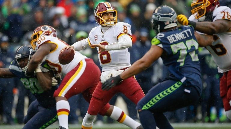 Quarterback Kirk Cousins of the Washington Redskins passes against the...