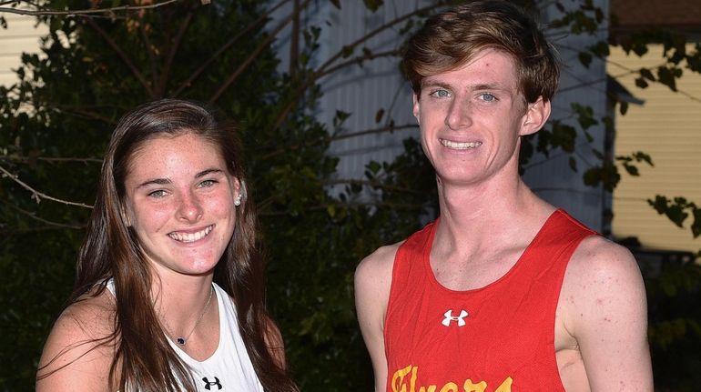 Marie Naudus, a senior at Sacred Heart Academy, and twin...