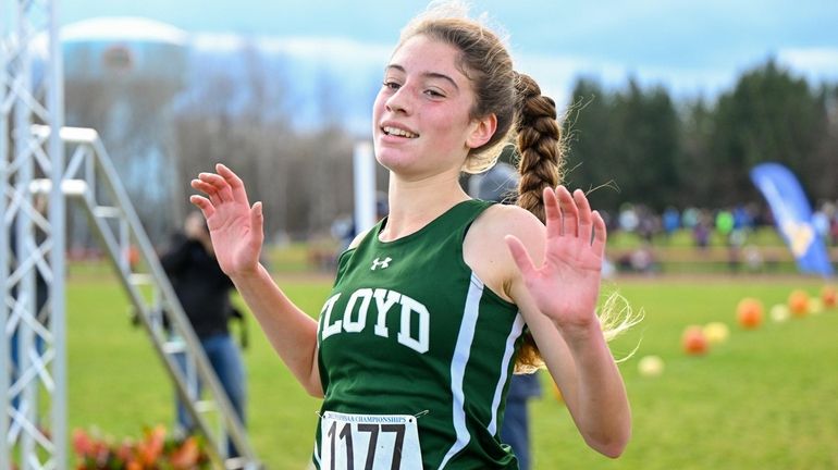 Floyd’s Zariel Macchia crosses the finish line during the girls Class...