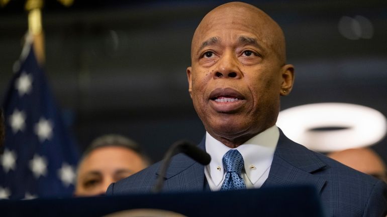 Mayor Eric Adams speaks during a news conference at the...