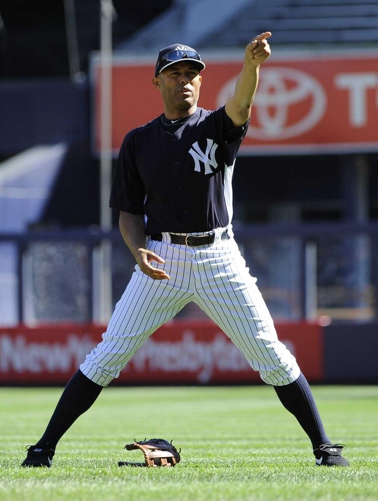 New York Yankees closer Mariano Rivera throws to first base in the 9th  inning against the San Francisco Giants at Yankee Stadium in New York City  on September 22, 2013. Rivera's hall