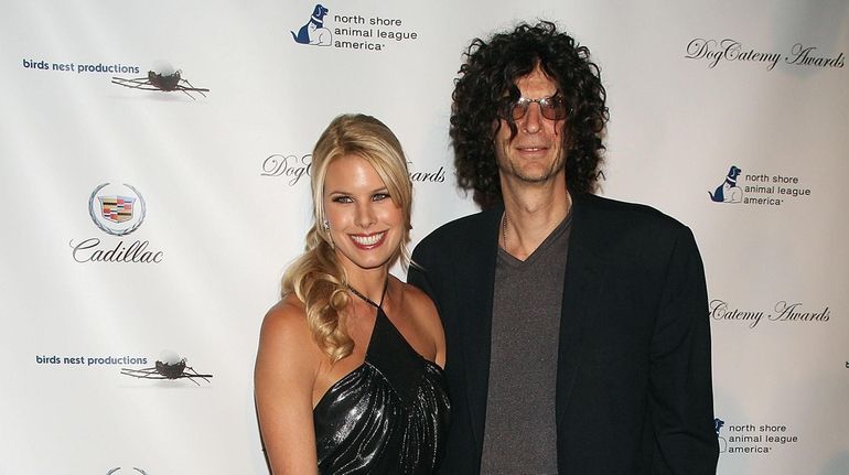 Beth Ostrosky, Howard Stern and their dog Bianca attend the...