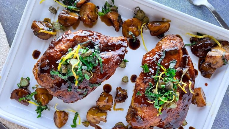 Chicken breasts with balsamic sauce, mushrooms, and fried cornichon topping.