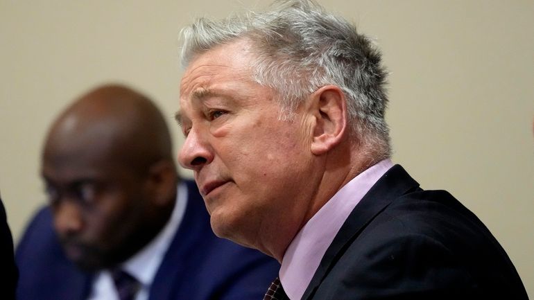 Actor Alec Baldwin listens during his hearing in Santa Fe...