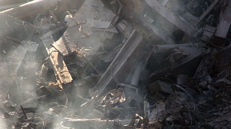 Rescue workers searching the World Trade Center ruins in October 2001.