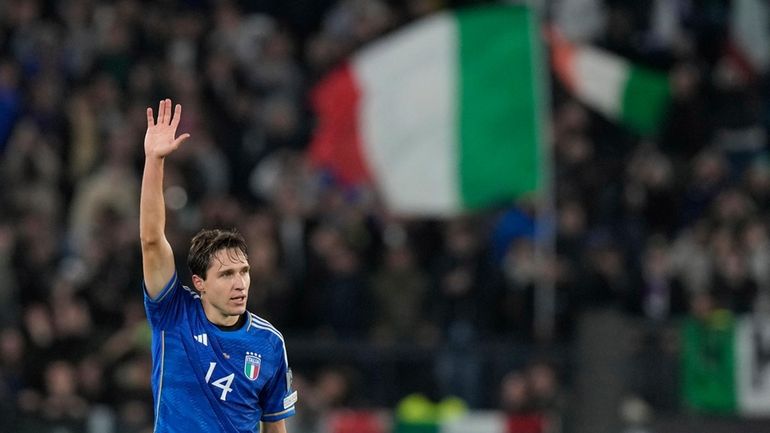 Italy's Federico Chiesa celebrates after scoring his sides third goal...