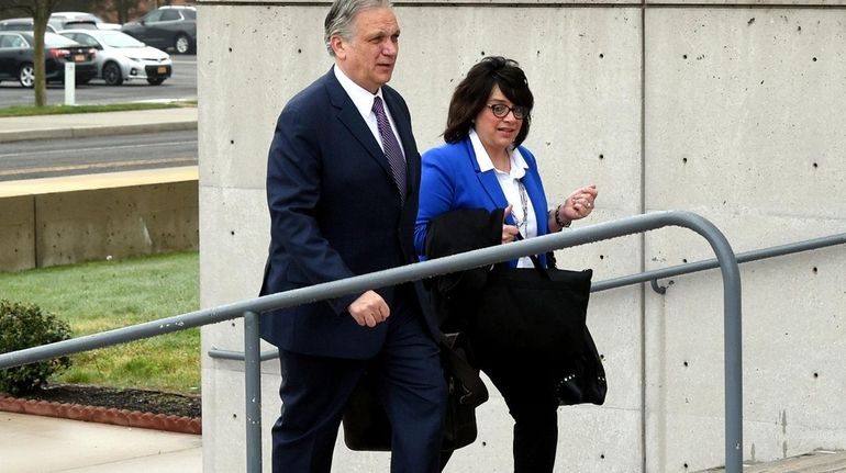 Former Nassau County Executive Edward Mangano and his wife, Linda,...