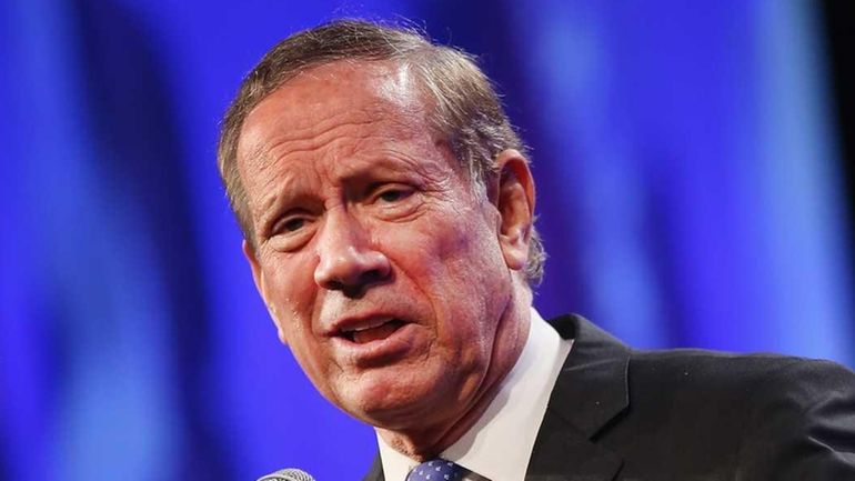 Former New York Gov. George Pataki speaks to guests gathered...