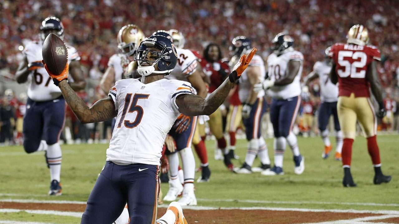 Chicago Bears wide receiver Brandon Marshall (15) celebrates a touchdown  against the Dallas Cowboys during the