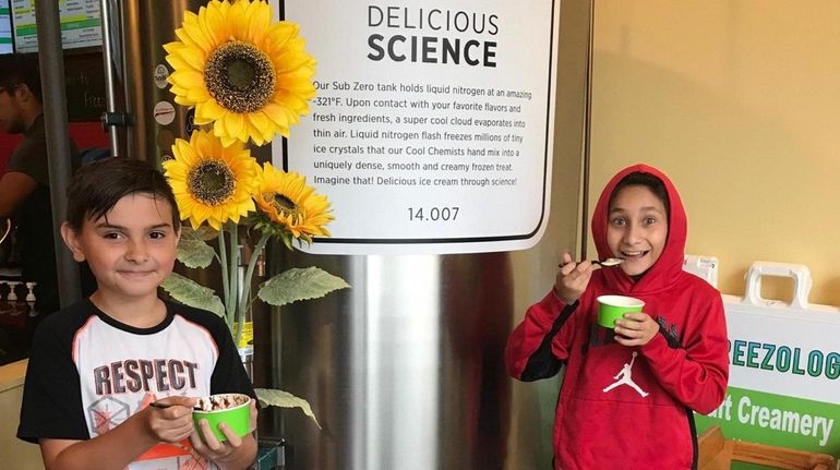 Kidsday reporters Devin Chester, left, and Yusuf Eismati of Jericho...