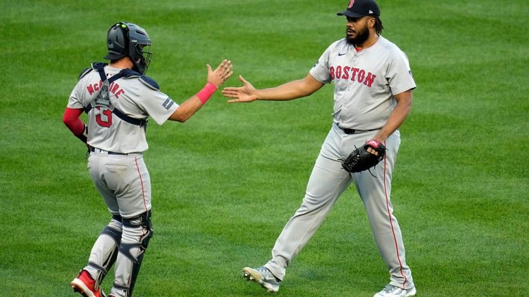 Boston Red Sox relief pitcher Kenley Jansen, right, celebrates with...