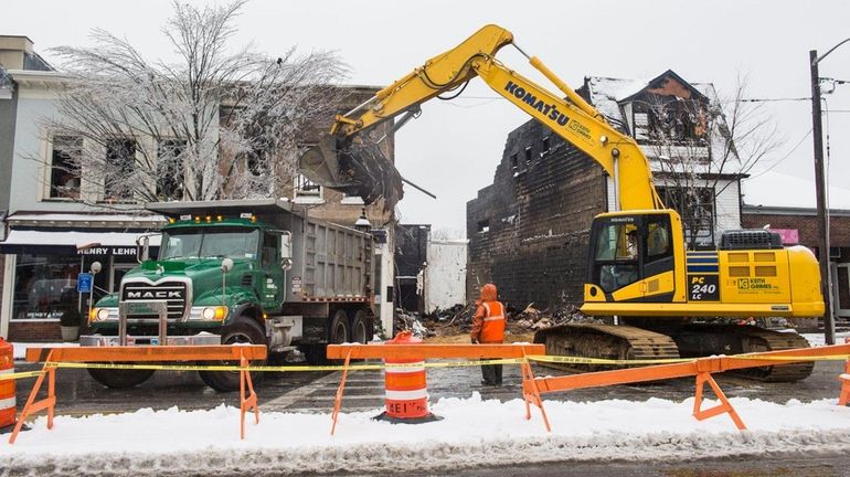 The remains of the Sag Harbor Cinema are removed following...