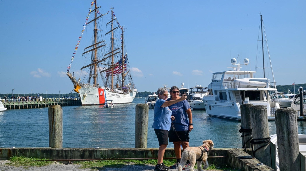 Greenport celebrates 25th anniversary of Mitchell Park, hosts ice rink fundraiser in scorching heat