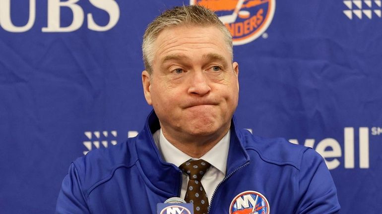 Head coach Patrick Roy of the Islanders speaks to the...