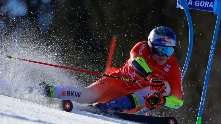 Switzerland's Marco Odermatt speeds down the course during an alpine...