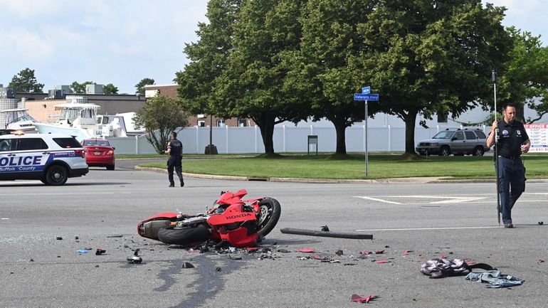 Suffolk County police on Wednesday at the scene of a crash...