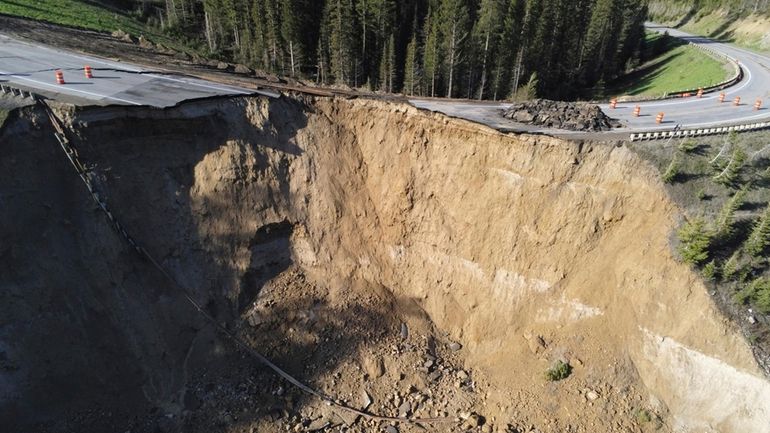 This photo provided by Wyoming Highway Patrol shows a damaged...