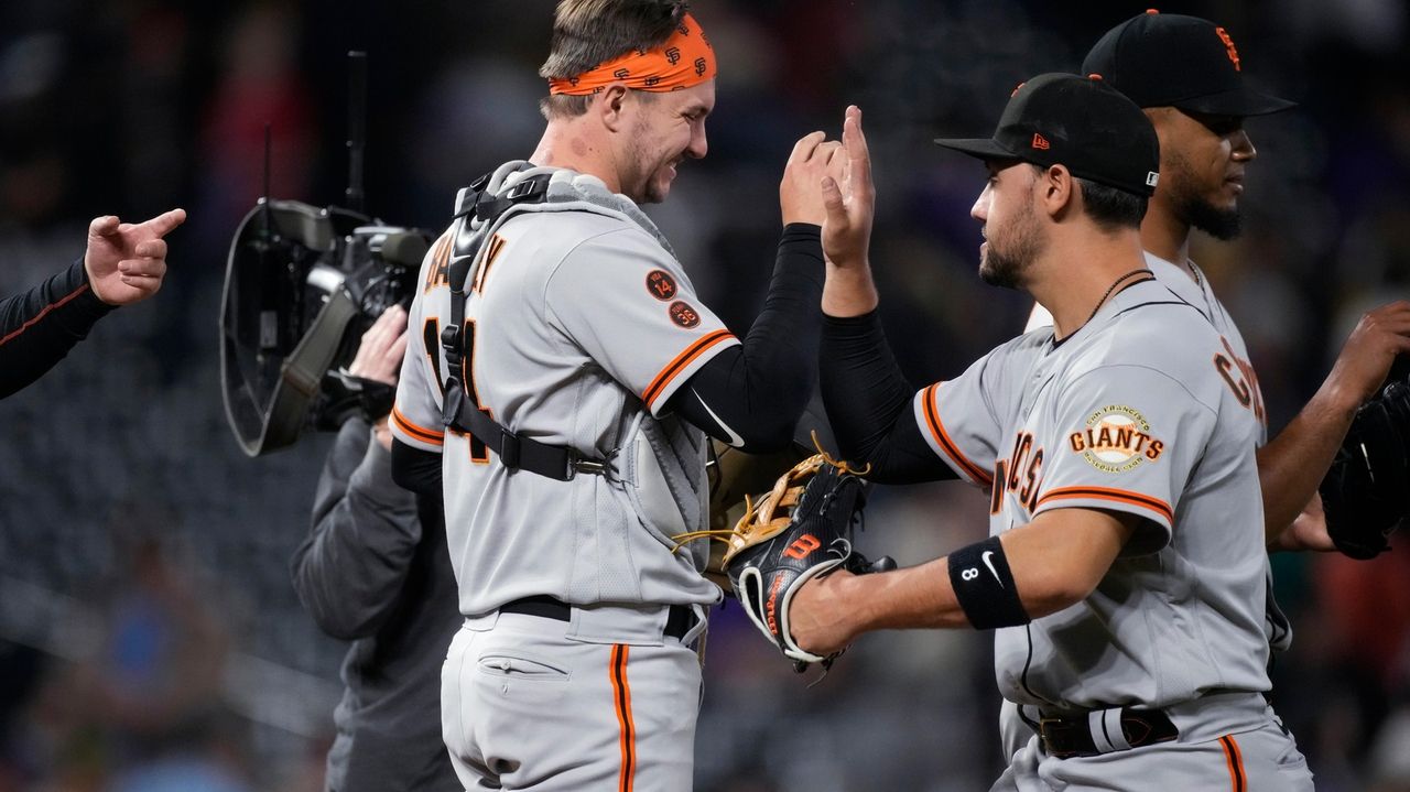Slater drives in runs in 7th and 8th, helps Giants rally to 54 win