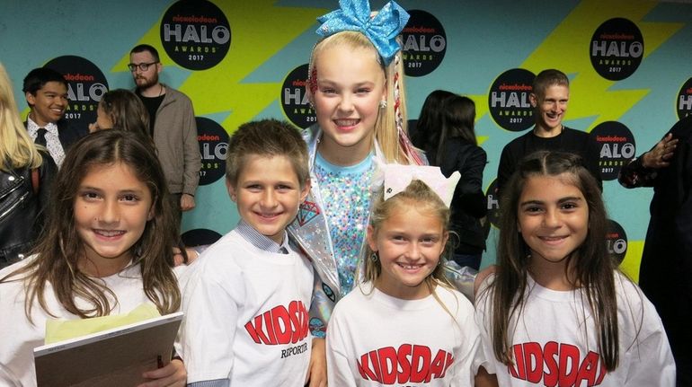 Kidsday reporters Marisa Patrissi, left, James Sullivan, Jessica Martin and...