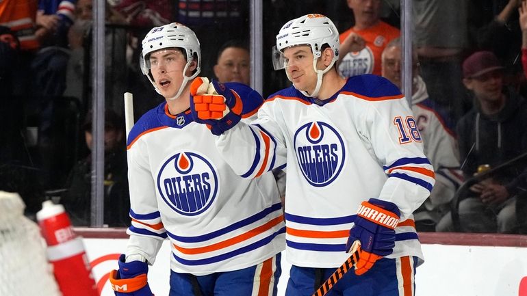 Edmonton Oilers left wing Zach Hyman (18) celebrates with center...