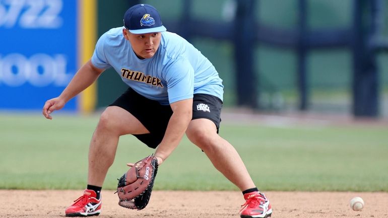 Trenton Thunder first baseman Rintaro Sasaki (49) fields a ground...